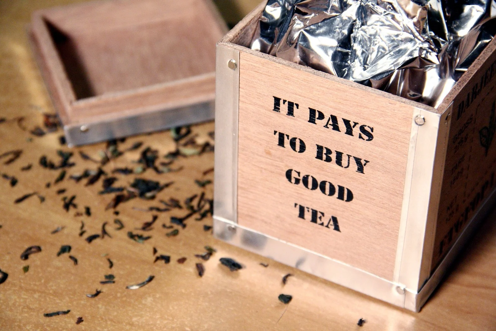 Tea leaves falling out of a crate